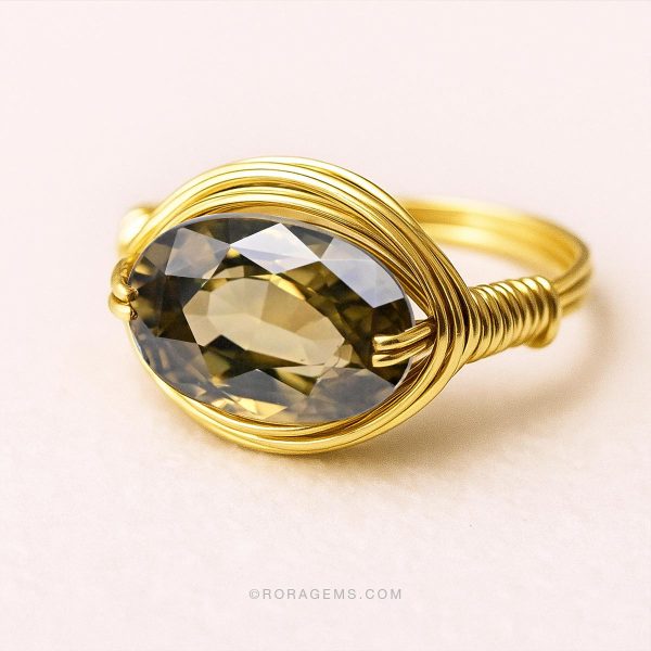 Natural zircon gemstone Sri Lanka – brownish green 8.50ct December birthstone for engagement rings and jewelry design in United Kingdom